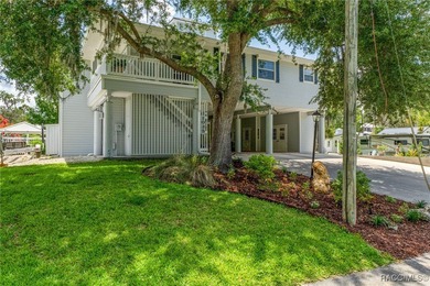 This updated waterfront stilt (DID NOT FLOOD) home in Crystal on Plantation Inn and Golf Resort  in Florida - for sale on GolfHomes.com, golf home, golf lot