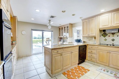 RARELY AVAILABLE POOL, LAKE  and GOLF COURSE views from this on Jacaranda Golf Club in Florida - for sale on GolfHomes.com, golf home, golf lot