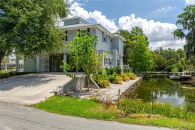 This updated waterfront stilt (DID NOT FLOOD) home in Crystal on Plantation Inn and Golf Resort  in Florida - for sale on GolfHomes.com, golf home, golf lot