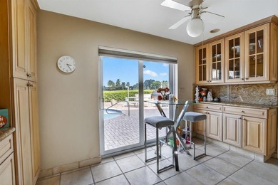 RARELY AVAILABLE POOL, LAKE  and GOLF COURSE views from this on Jacaranda Golf Club in Florida - for sale on GolfHomes.com, golf home, golf lot