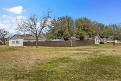 Welcome to 102 Bowie Cove, an exceptional residence nestled on Lake Kiowa Golf Course in Texas - for sale on GolfHomes.com, golf home, golf lot