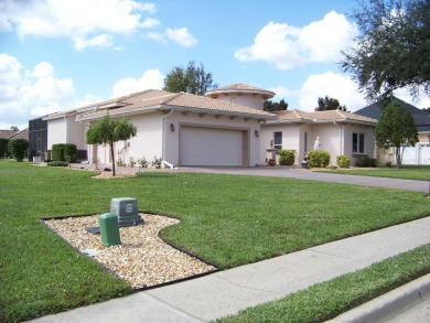 WELCOME HOME to this 3 bedroom, 2 1/2 bath house in the on Harbor Hills Country Club in Florida - for sale on GolfHomes.com, golf home, golf lot