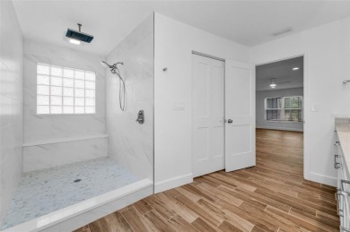 Under contract-accepting backup offers. Fully Renovated on Feather Sound Country Club in Florida - for sale on GolfHomes.com, golf home, golf lot