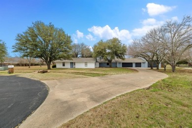 Welcome to 102 Bowie Cove, an exceptional residence nestled on Lake Kiowa Golf Course in Texas - for sale on GolfHomes.com, golf home, golf lot