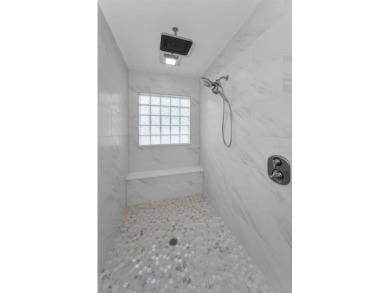 Under contract-accepting backup offers. Fully Renovated on Feather Sound Country Club in Florida - for sale on GolfHomes.com, golf home, golf lot