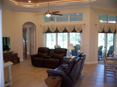 WELCOME HOME to this 3 bedroom, 2 1/2 bath house in the on Harbor Hills Country Club in Florida - for sale on GolfHomes.com, golf home, golf lot