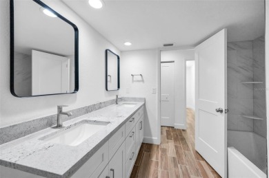 Under contract-accepting backup offers. Fully Renovated on Feather Sound Country Club in Florida - for sale on GolfHomes.com, golf home, golf lot