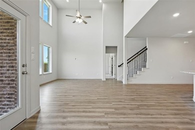 This spacious DRB Home Magnolia floor plan gives 2,722 of usable on Lake Arlington Golf Course in Texas - for sale on GolfHomes.com, golf home, golf lot
