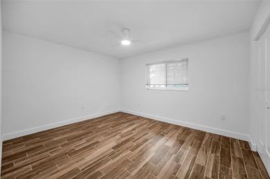 Under contract-accepting backup offers. Fully Renovated on Feather Sound Country Club in Florida - for sale on GolfHomes.com, golf home, golf lot