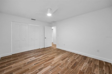 Under contract-accepting backup offers. Fully Renovated on Feather Sound Country Club in Florida - for sale on GolfHomes.com, golf home, golf lot