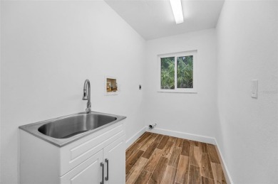 Under contract-accepting backup offers. Fully Renovated on Feather Sound Country Club in Florida - for sale on GolfHomes.com, golf home, golf lot