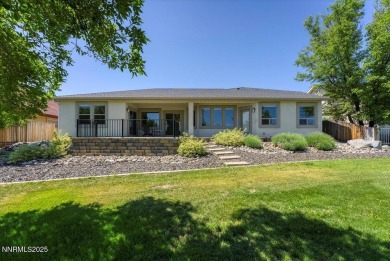 Located on the 12th Fairway, this beautifully-maintained custom on Silver Oak Golf Course in Nevada - for sale on GolfHomes.com, golf home, golf lot