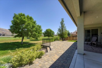 Located on the 12th Fairway, this beautifully-maintained custom on Silver Oak Golf Course in Nevada - for sale on GolfHomes.com, golf home, golf lot