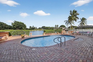 RARELY AVAILABLE POOL, LAKE  and GOLF COURSE views from this on Jacaranda Golf Club in Florida - for sale on GolfHomes.com, golf home, golf lot