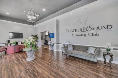 Under contract-accepting backup offers. Fully Renovated on Feather Sound Country Club in Florida - for sale on GolfHomes.com, golf home, golf lot