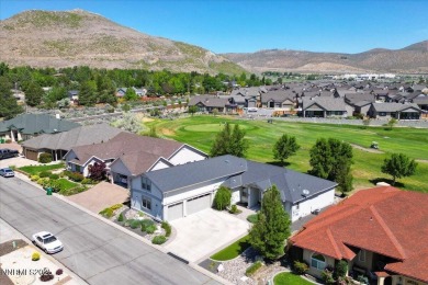 Located on the 12th Fairway, this beautifully-maintained custom on Silver Oak Golf Course in Nevada - for sale on GolfHomes.com, golf home, golf lot