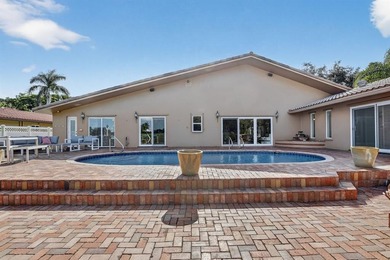 RARELY AVAILABLE POOL, LAKE  and GOLF COURSE views from this on Jacaranda Golf Club in Florida - for sale on GolfHomes.com, golf home, golf lot