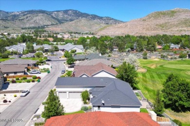 Located on the 12th Fairway, this beautifully-maintained custom on Silver Oak Golf Course in Nevada - for sale on GolfHomes.com, golf home, golf lot