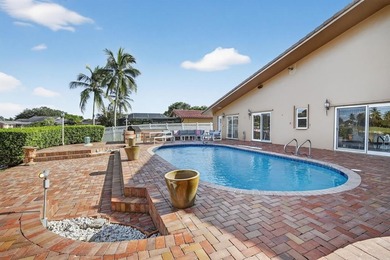 RARELY AVAILABLE POOL, LAKE  and GOLF COURSE views from this on Jacaranda Golf Club in Florida - for sale on GolfHomes.com, golf home, golf lot