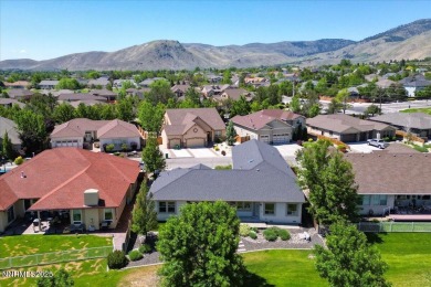 Located on the 12th Fairway, this beautifully-maintained custom on Silver Oak Golf Course in Nevada - for sale on GolfHomes.com, golf home, golf lot