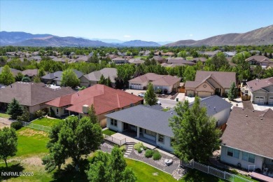 Located on the 12th Fairway, this beautifully-maintained custom on Silver Oak Golf Course in Nevada - for sale on GolfHomes.com, golf home, golf lot