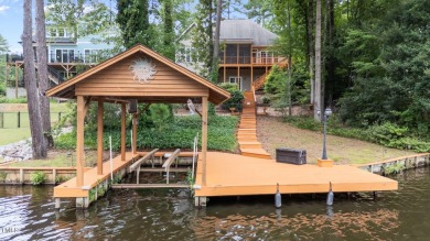 Live the Lake Life every day! This beautifully designed home for sale on GolfHomes.com