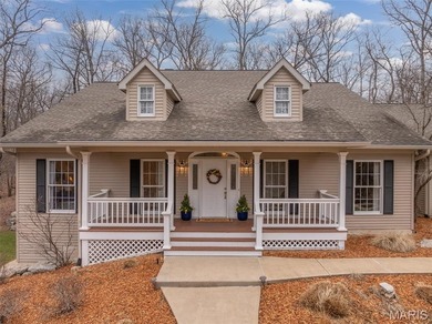 Tucked at the end of a quiet street in Innsbrook, this charming on Innsbrook Resort Golf Course in Missouri - for sale on GolfHomes.com, golf home, golf lot