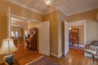 Tucked at the end of a quiet street in Innsbrook, this charming on Innsbrook Resort Golf Course in Missouri - for sale on GolfHomes.com, golf home, golf lot