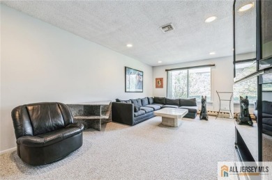 Just over 1000 sq ft, this cozy Timberline floor plan with 2b/2b on Clearbrook Golf Club in New Jersey - for sale on GolfHomes.com, golf home, golf lot