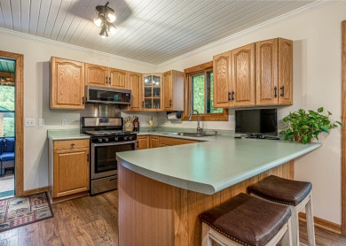 Location, Location, Location! Wooded serenity with the comforts on Minocqua Country Club in Wisconsin - for sale on GolfHomes.com, golf home, golf lot