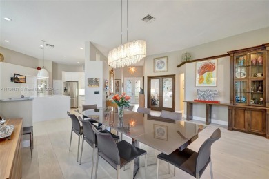 Stunning totally updated 3-bed, 3-bath home in exclusive Bay on Weston Hills Country Club in Florida - for sale on GolfHomes.com, golf home, golf lot