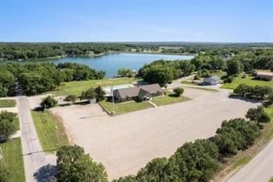 Escape the city and embrace peaceful living in this brand-new on Linn Valley Lakes - Deer Trace Golf Course in Kansas - for sale on GolfHomes.com, golf home, golf lot