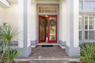 Discover an elegant retreat nestled on a quiet cul-de-sac street on Golf Club At North Hampton in Florida - for sale on GolfHomes.com, golf home, golf lot