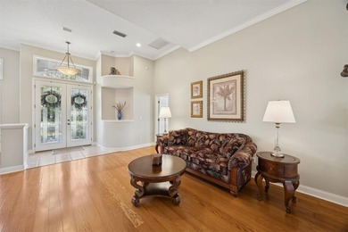 Discover an elegant retreat nestled on a quiet cul-de-sac street on Golf Club At North Hampton in Florida - for sale on GolfHomes.com, golf home, golf lot