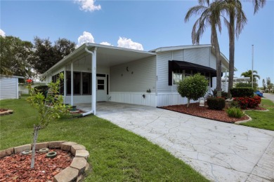 Spacious 2005 Triple-Wide Jacobsen built home situated on a 7 on Maple Leaf Golf and Country Club in Florida - for sale on GolfHomes.com, golf home, golf lot