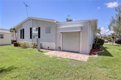 Spacious 2005 Triple-Wide Jacobsen built home situated on a 7 on Maple Leaf Golf and Country Club in Florida - for sale on GolfHomes.com, golf home, golf lot