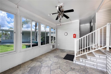 Spacious 2005 Triple-Wide Jacobsen built home situated on a 7 on Maple Leaf Golf and Country Club in Florida - for sale on GolfHomes.com, golf home, golf lot