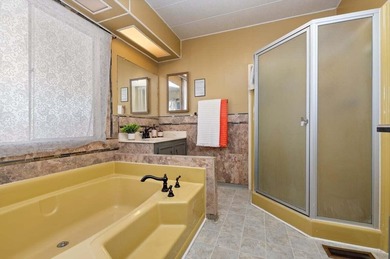 Where can you find a more than reasonably priced manufactured on Palm Desert Greens Country Club in California - for sale on GolfHomes.com, golf home, golf lot