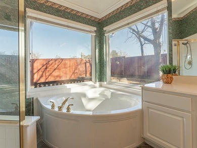 New roof, HVAC, dishwasher & updated windows make this one-story on Oakmont Country Club in Texas - for sale on GolfHomes.com, golf home, golf lot