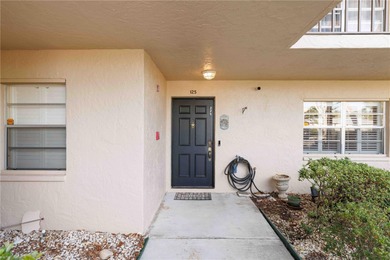 Looking for a ground-floor condo with a beautiful golf course on Palm Aire Country Club of Sarasota in Florida - for sale on GolfHomes.com, golf home, golf lot