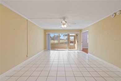 Looking for a ground-floor condo with a beautiful golf course on Palm Aire Country Club of Sarasota in Florida - for sale on GolfHomes.com, golf home, golf lot