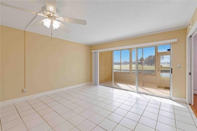 Looking for a ground-floor condo with a beautiful golf course on Palm Aire Country Club of Sarasota in Florida - for sale on GolfHomes.com, golf home, golf lot