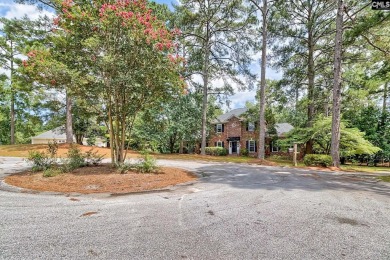 This beautiful all-brick colonial home in the highly sought on Spring Valley Country Club in South Carolina - for sale on GolfHomes.com, golf home, golf lot