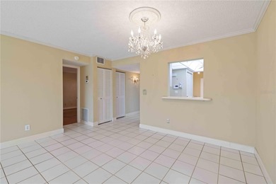 Looking for a ground-floor condo with a beautiful golf course on Palm Aire Country Club of Sarasota in Florida - for sale on GolfHomes.com, golf home, golf lot