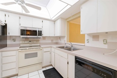 Looking for a ground-floor condo with a beautiful golf course on Palm Aire Country Club of Sarasota in Florida - for sale on GolfHomes.com, golf home, golf lot