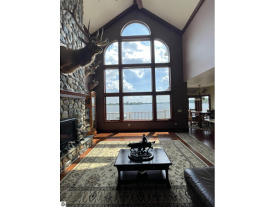 Beautiful waterfront house on Lake Isabella, an 800-acre on The Pines Golf Course at Lake Isabella in Michigan - for sale on GolfHomes.com, golf home, golf lot