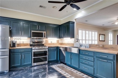 Start and end your days enjoying lagoon and wood views from your on Hidden Cypress Golf Club in South Carolina - for sale on GolfHomes.com, golf home, golf lot