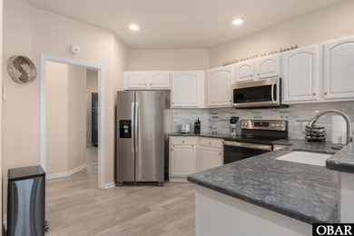 Set on the soundfront in The Currituck Club's Magnolia Bay on The Currituck Golf Club in North Carolina - for sale on GolfHomes.com, golf home, golf lot