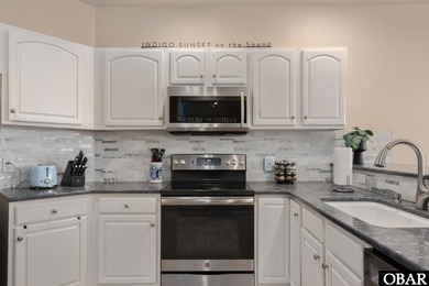 Set on the soundfront in The Currituck Club's Magnolia Bay on The Currituck Golf Club in North Carolina - for sale on GolfHomes.com, golf home, golf lot