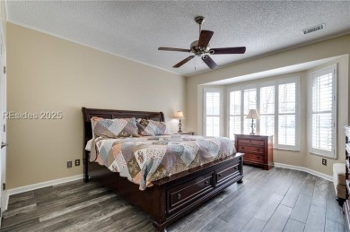 Start and end your days enjoying lagoon and wood views from your on Hidden Cypress Golf Club in South Carolina - for sale on GolfHomes.com, golf home, golf lot